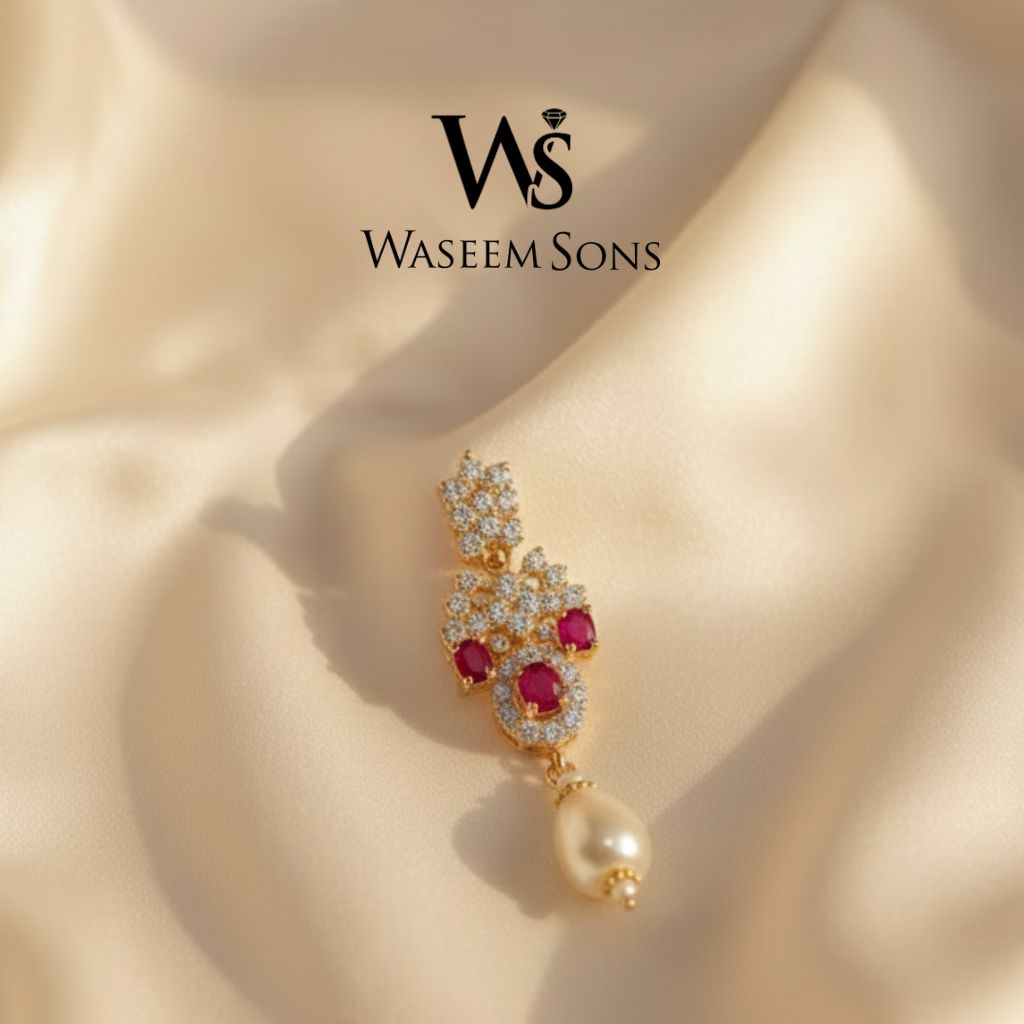 Matching ruby pearl bridal earrings gold polish