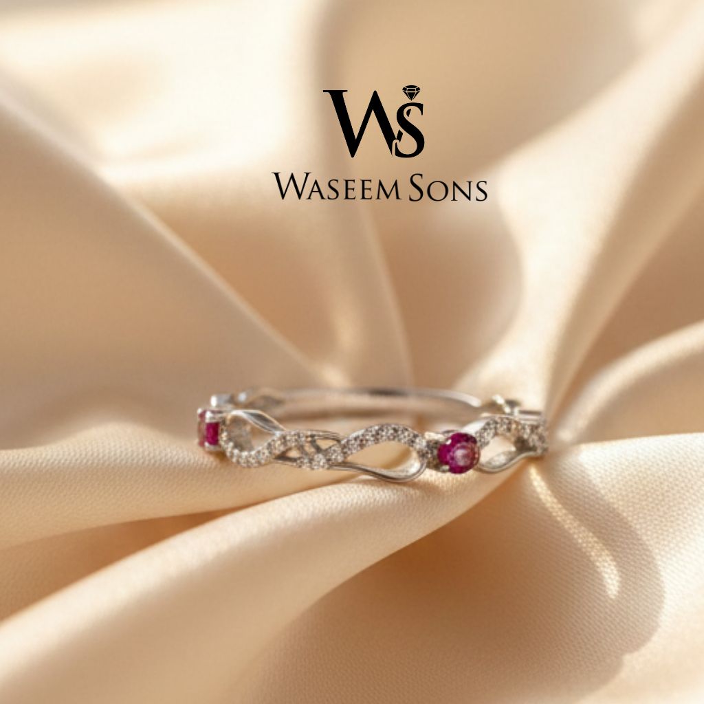 Front view of Mini Ruby Twist Bangle sterling silver bracelet